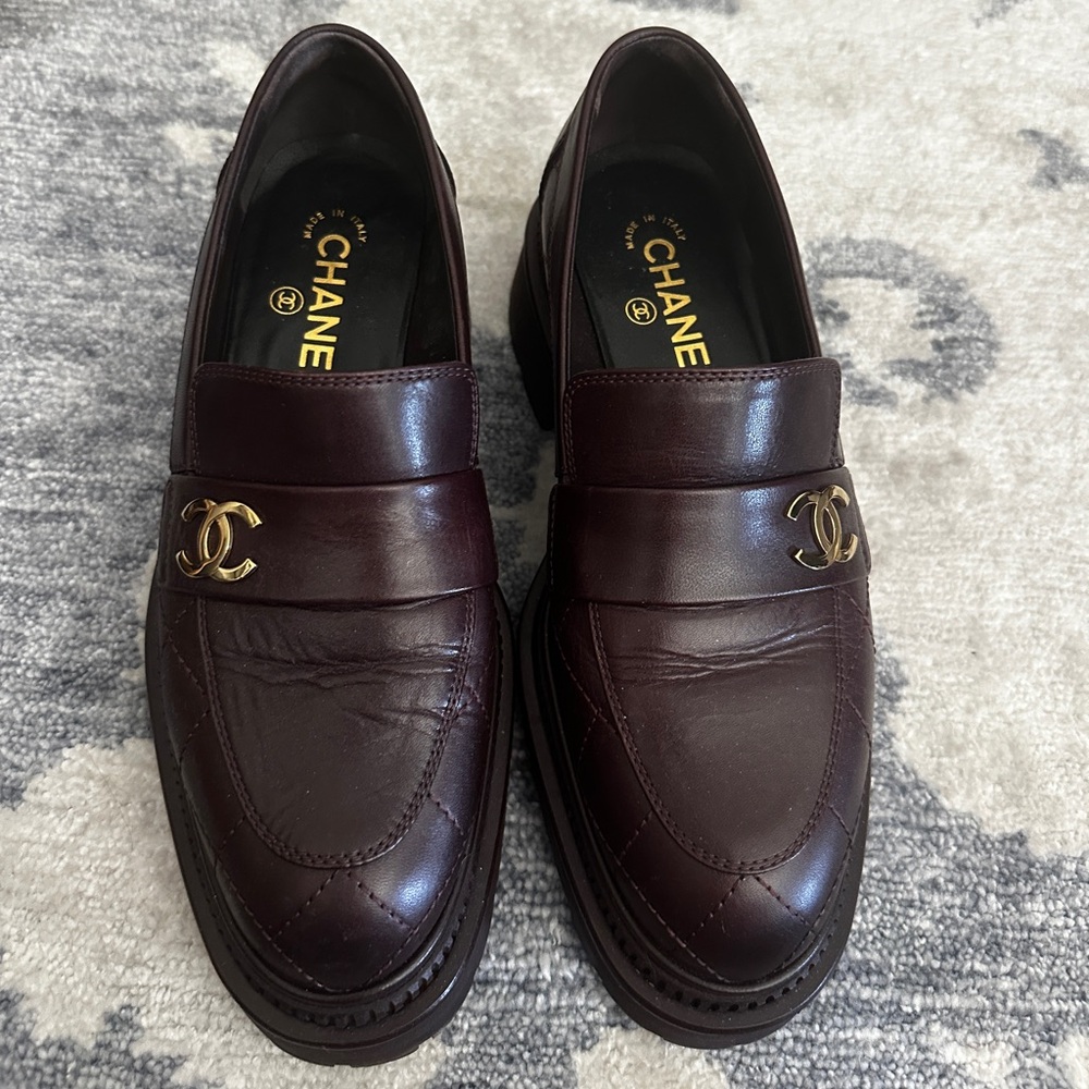 Chanel Deep Burgundy Leather Loafers with Gold Emblem